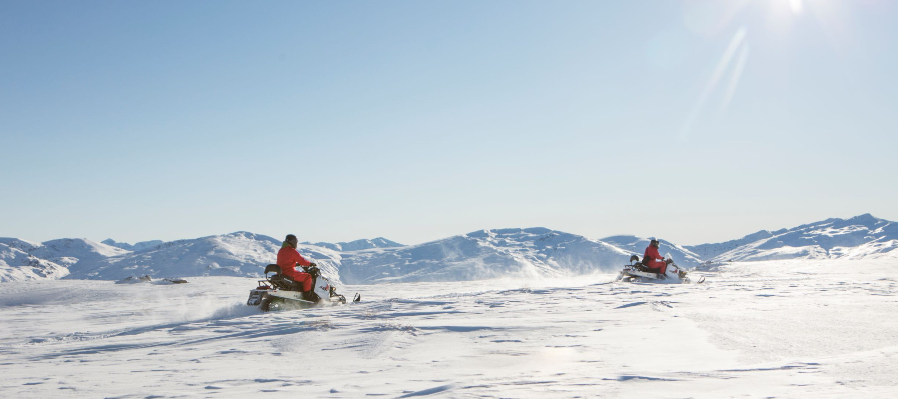 Queenstown Snowmobiles  two snowmobilers on Garvie Plateau